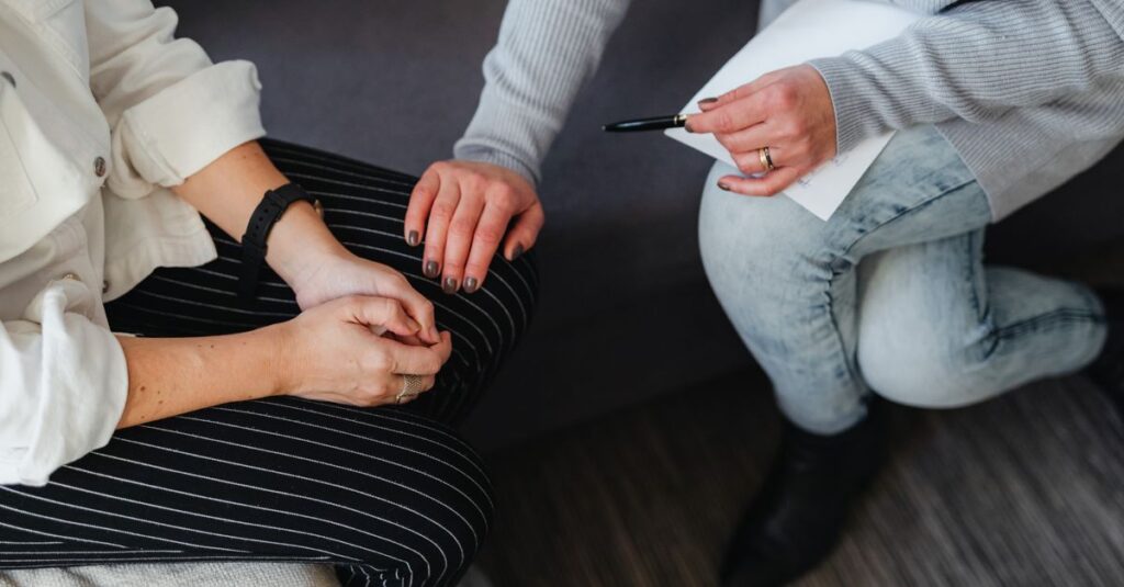 A supportive moment during a counseling session, featuring attentive listening and comfort.